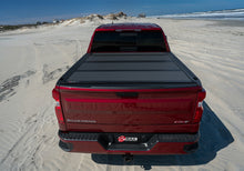 Load image into Gallery viewer, BAK 2022+ Toyota Tundra 5.5ft Bed BAKFlip MX4 Bed Cover