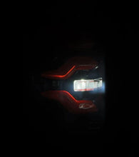 Load image into Gallery viewer, AlphaRex 87-96 Ford Bronco/F-150 Luxx-Series LED Tail Lights - Black Red