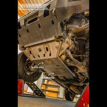 Load image into Gallery viewer, view of oil filter and oil drain access on a C4 Fabrication 4Runner front skid plate